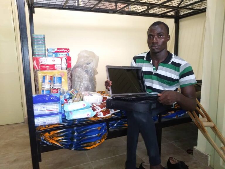 AKWETEY RECEIVES PROVISIONS, HYGIENE PRODUCTS, CLOTHES AND LAPTOP AT UNIVERSITY