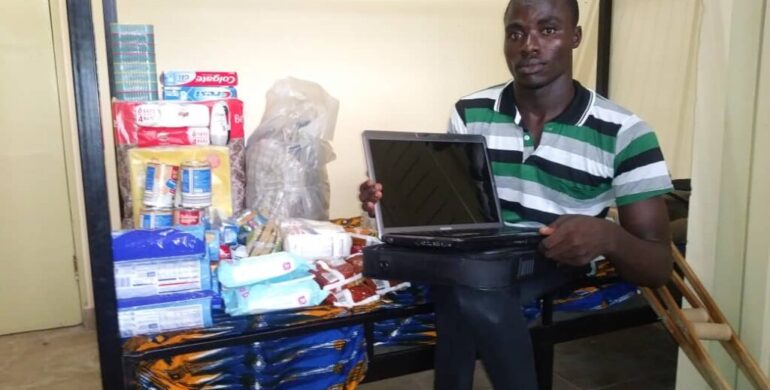 AKWETEY RECEIVES PROVISIONS, HYGIENE PRODUCTS, CLOTHES AND LAPTOP AT UNIVERSITY